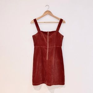 Twik 100% coton bio dress in burnt orange cor du roy with front zip.